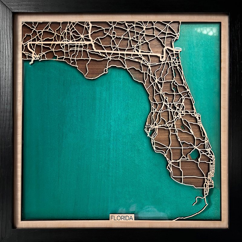 Laser-cut wooden map of Florida with turquoise Gulf and Atlantic